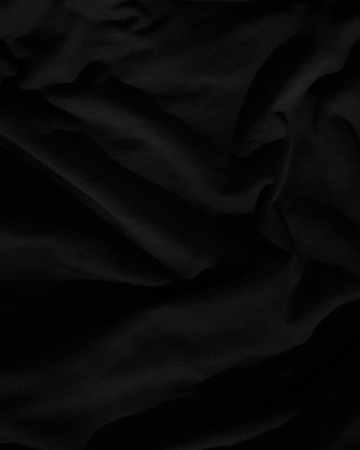 Placeholder: a hand-cut edge macro, standing in for the embroidery being cut open by feel.